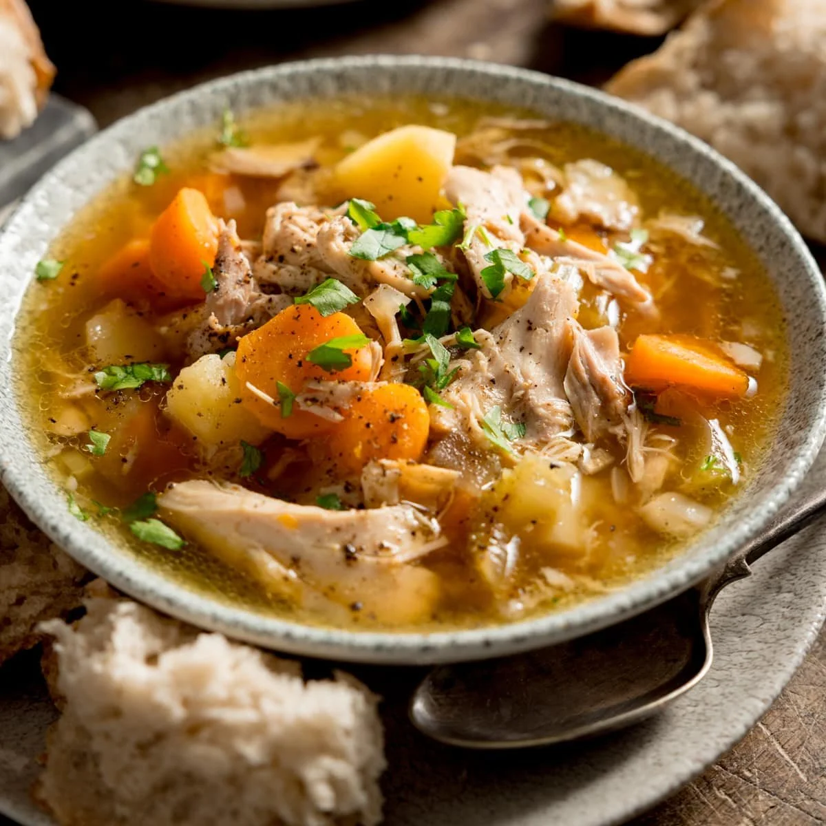Hearty crockpot soup served in a bowl, perfect for cozy meals.