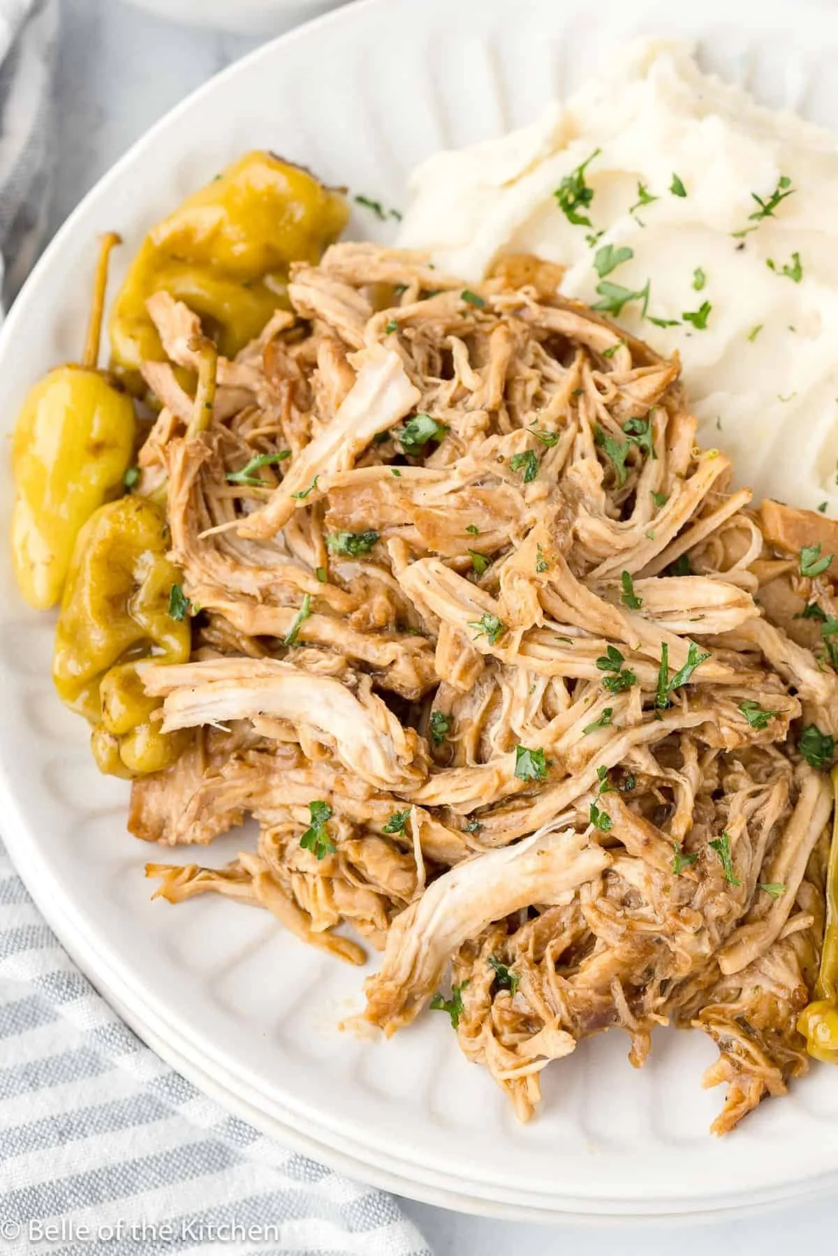 Delicious Mississippi Chicken cooked in a Crock Pot for a hearty meal.