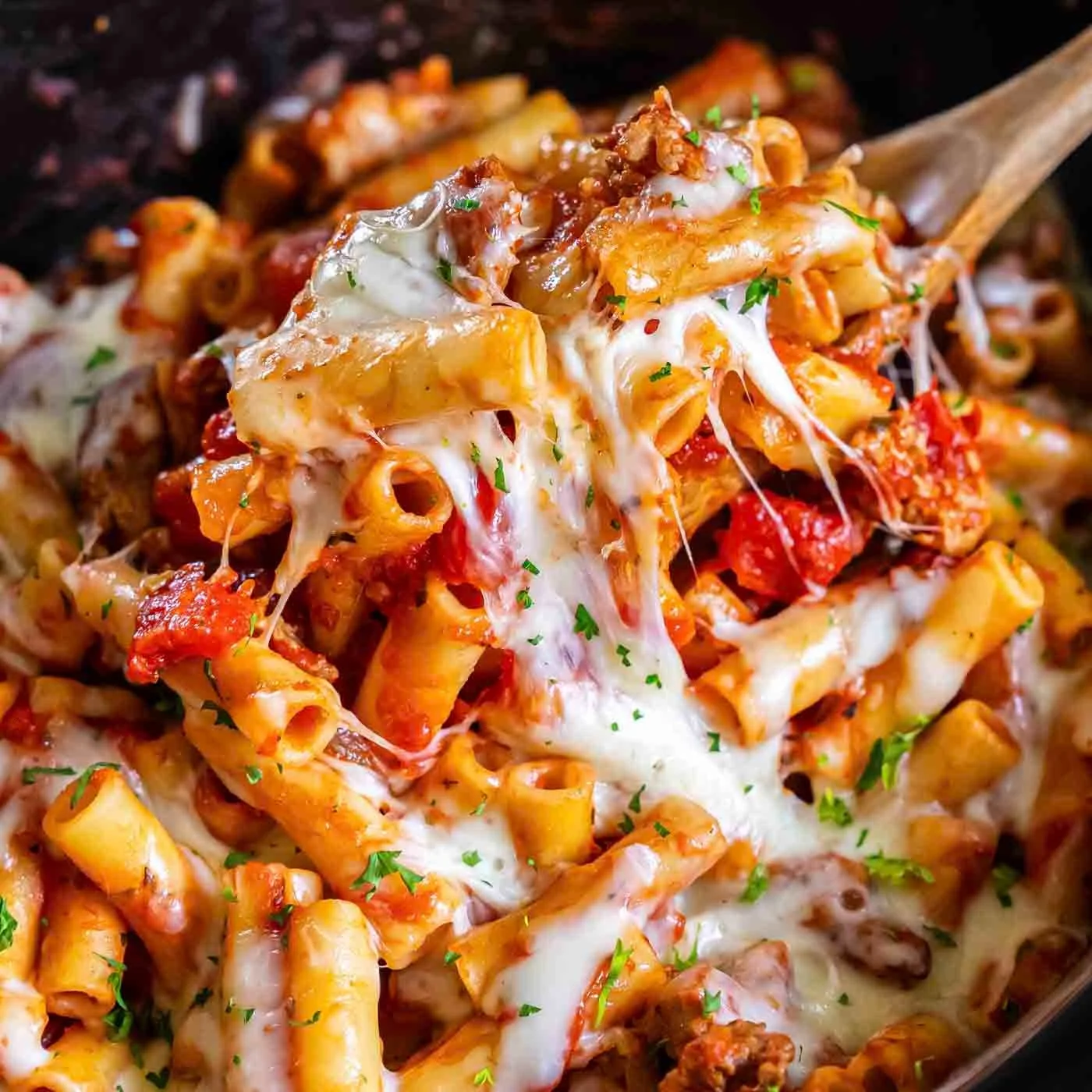 Delicious slow cooker baked ziti with melted cheese and pasta