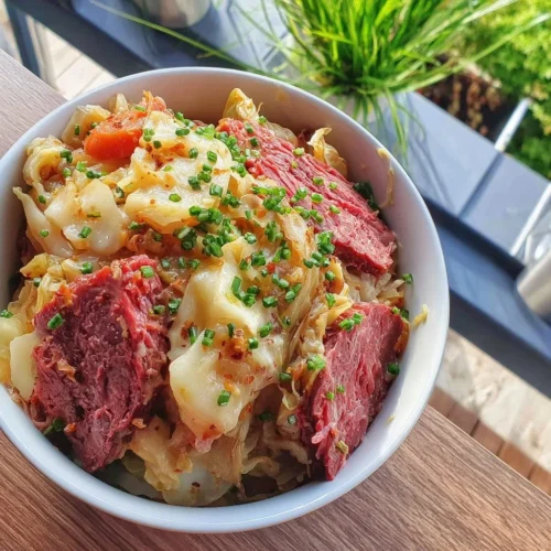 Delicious corned beef and cabbage recipe served on a plate
