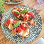 Delicious Bruschetta with Cherry Tomatoes and Fresh Basil Recipe