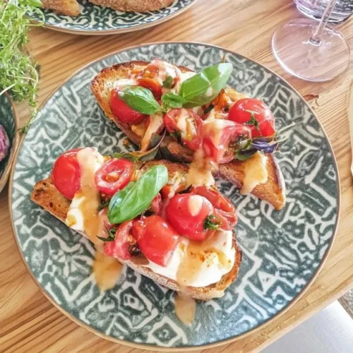 Delicious Bruschetta with Cherry Tomatoes and Fresh Basil Recipe