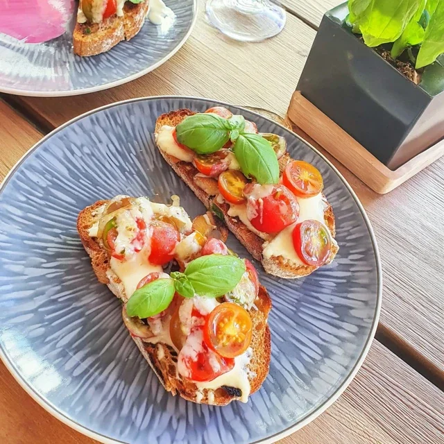 Delicious Bruschetta with Cherry Tomatoes and Fresh Basil Recipe