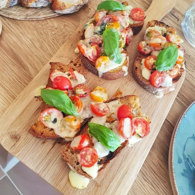 Delicious Bruschetta with Cherry Tomatoes and Fresh Basil Recipe