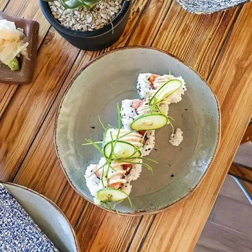 Homemade California Roll Sushi featuring cucumber and avocado ingredients