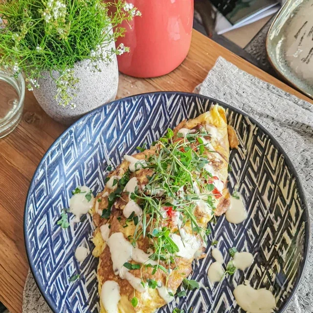 Deliciously Gourmet Omelette with Fresh Herbs and Creamy Goat Cheese Recipe