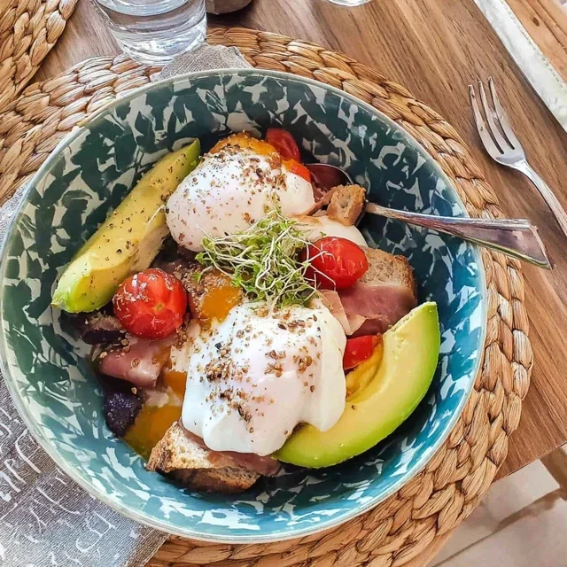 Healthy Energizing Brunch Bowl with Poached Eggs and Avocado