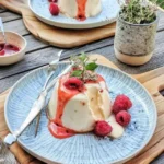 Silky Smooth Vanilla Panna Cotta with Tangy Raspberry Coulis Recipe