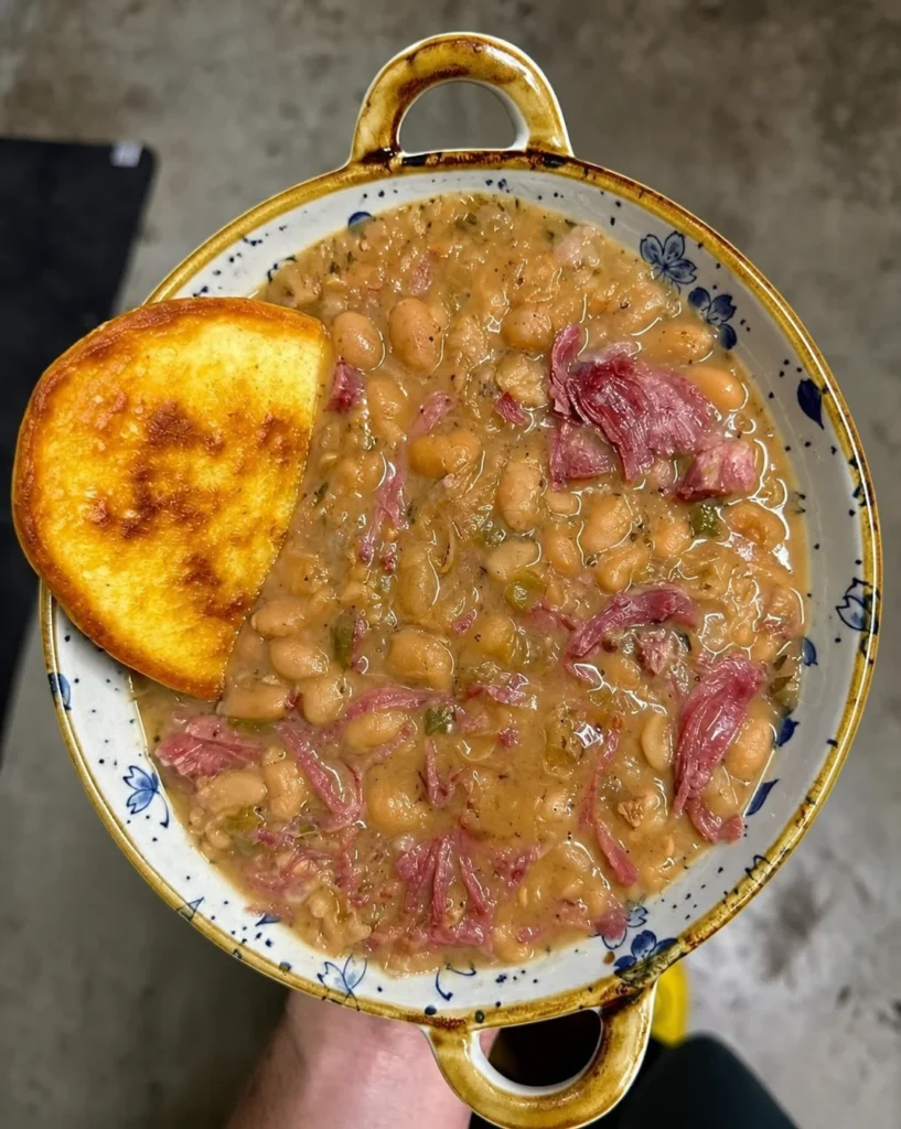 Great northern beans with smoked turkey neckbones and ho cakes π₯π₯ Pass me the hot sauce