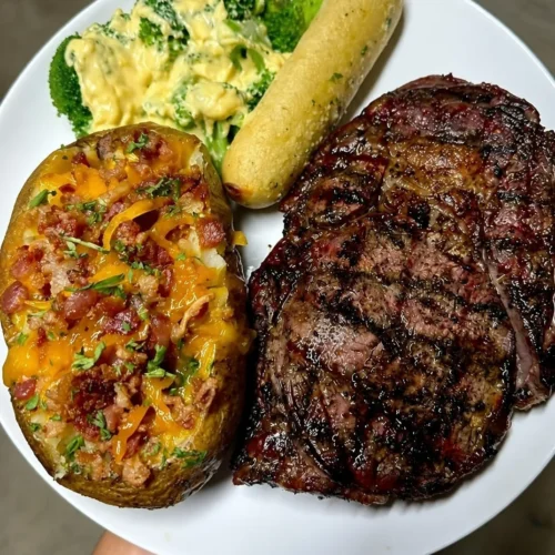 Smoked Ribeye with Cheesy Broccoli and Loaded Baked Potato – a hearty, protein-packed, crowd-pleasing favourite