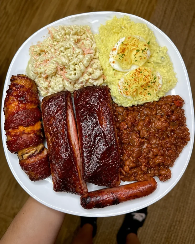 Smoked ribs, cowboy beans, Hawaiian mac salad, deviled egg potato salad and a lil hotdog – delicious, hearty, crowd-pleasing barbecue favourites 🔥🔥🔥🔥