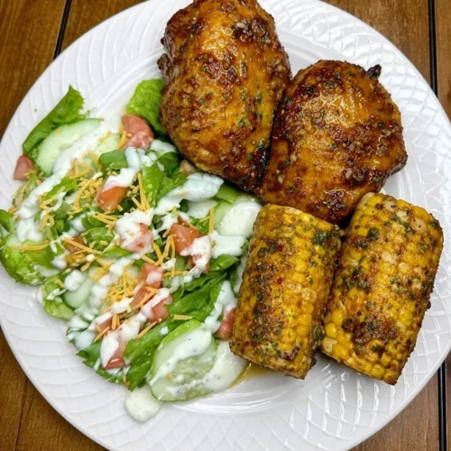 Sticky Honey Garlic Chicken Thighs with Garlic Butter Corn on the Cob & Fresh Salad with Ranch Dressing – Juicy, Quick, and Family-Friendly